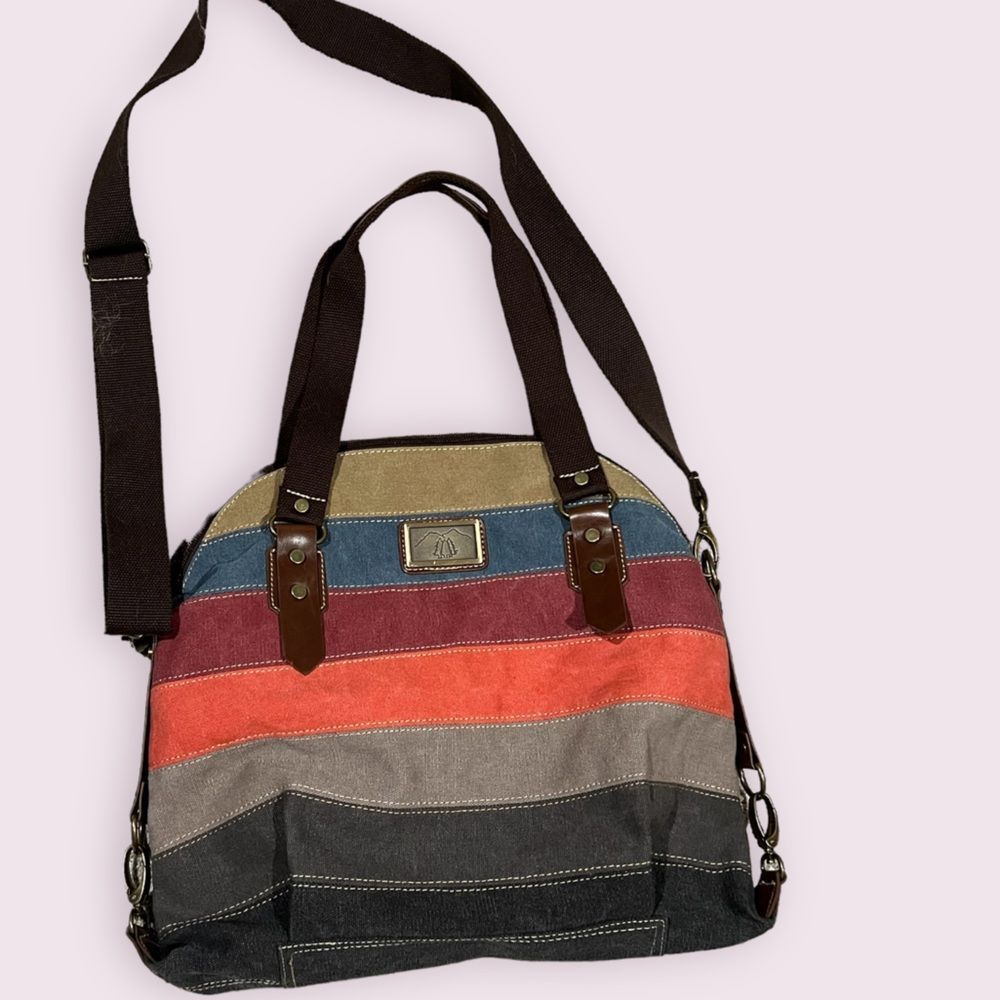 Large Multi colored canvas tote leather accents. Purse weekender bag crossbody